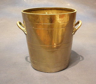A silver plated twin handled wine cooler