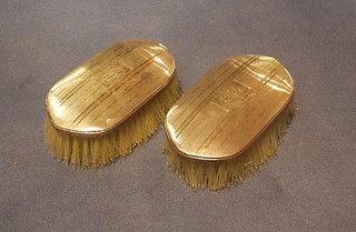 A pair of Sterling silver backed military hair brushes