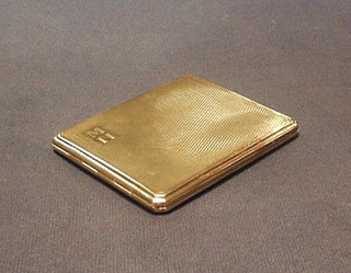 A silver cigarette case with engine turned decoration Birmingham 1944