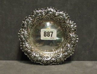 An Edwardian circular embossed silver dish (marks rubbed) 5"