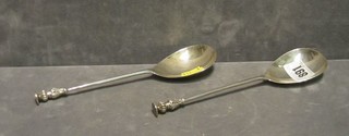 A pair of silver seal end serving spoons, London 1910 4 ozs