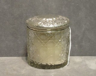 An Edwardian cut glass dressing table jar with embossed silver cover, Birmingham 1905