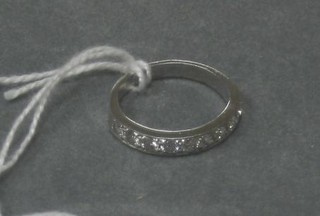 A lady's white gold half eternity ring set 9 diamonds (approx 0.81ct)