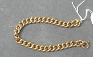 A 9ct gold curb link bracelet 7"