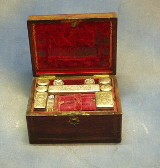 A Victorian inlaid rosewood vanity box, inlaid brass stringing, the interior fitted cut glass jars with silver plated tops 30"