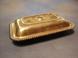 A silver plated entree dish and cover (no handle)