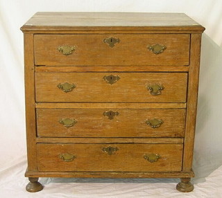 A Queen Anne oak chest of 4 long drawers, raised on bun supports 36"