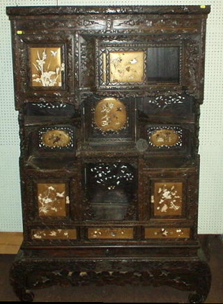 A 19th Century Oriental pierced hardwood Fujiama cabinet with gilt and lacquered panels, 42"