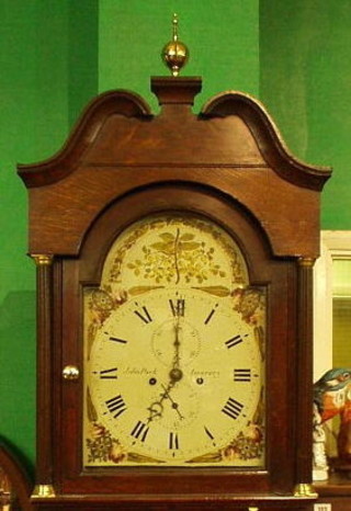 An 18th Century 8 day striking longcase clock, the 12" arched painted dial with floral spandrels, minute indicator and calendar hand, by John Park of Inverary, contained in an oak case 82"