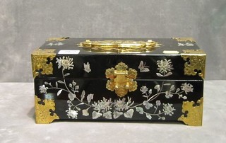 An Oriental lacquered jewellery box inlaid mother of pearl and with pierced brass mounts 12"