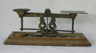 An old brass letter scale