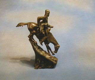 After Remington, a modern bronze figure of an Indian on a horse 12"