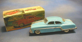 A Minster Delux tin plate model motor car, boxed