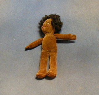 A Nora Wellings felt doll in the form of a Native