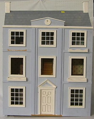 A childs dolls house and a quantity of furniture, 24"