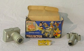 A Johnson Disney film strip projector, boxed