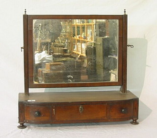 A Georgian rectangular plate dressing table mirror, raised on a mahogany stand, the base fitted 1 long and 2 short drawers 21"