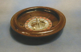 A Chad Valley Bakelite roulette wheel