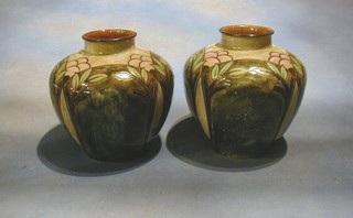 A pair of Royal Doulton circular vases, the base marked Royal Doulton, incised MB and impressed 8701 8"