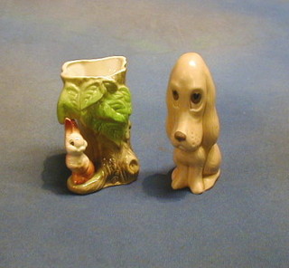 A Sylvac model of a seated dog 6" and an Eastgate pottery vase in the form of a squirrel by tree stump 4"