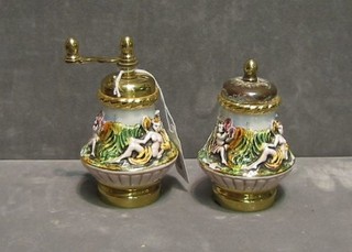 A Capo di Monte porcelain pepper mill and do. salt cellar