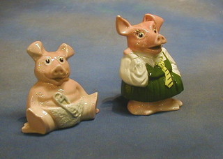 2 Natwest Wade money boxes in the form of a girl pig and baby pig