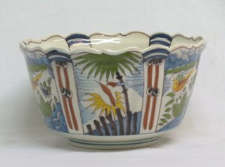 An Italian pottery bowl decorated a bird 8"