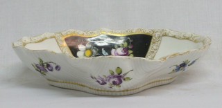 A Meissen porcelain scallop shaped dish with segmented decoration, the base with cancellation mark 7"