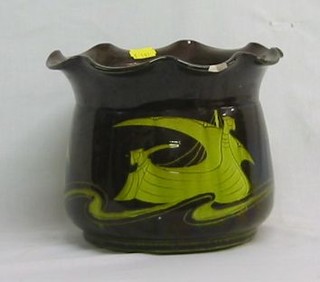 A green glazed pottery jardiniere (f) 8"