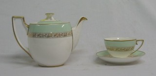 An 18 piece Wedgwood tea service with duck egg green borders and gilt banding, the base marked BB3521 H4567 comprising twin handled bread plate, 5 tea plates, teapot (cracked), cream jug, 5 cups and saucers