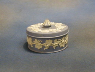 A circular Wedgwood blue Jasperware bowl and cover, the base marked Wedgwood England 5"