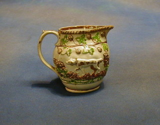 A 19th Century copper lustre jug decorated hounds 5"