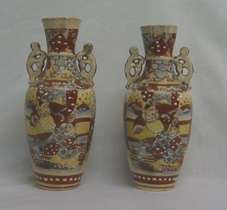 A pair of late Satsuma pottery twin handled vases 10"