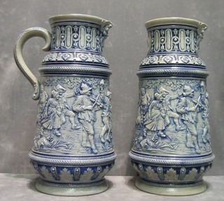 A pair of 19th Century German salt glazed jugs impressed 238A (1 f) 12"