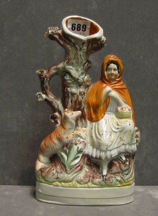 A Staffordshire flat back spill vase in the form of Little Red Riding Hood and the Wolf 10"