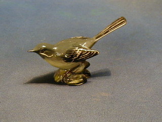 A Beswick figure of a Grey Wagtail, base marked 1041, 4"