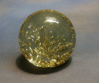 A large clear glass paperweight