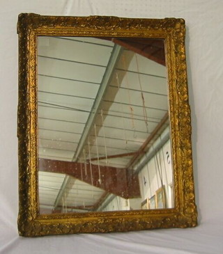 A 19th Century rectangular plate mirror contained in a gilt frame 31"