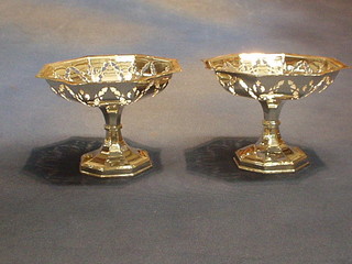 A pair of 1930's octagonal pierced silver plated pedestal dishes 5"