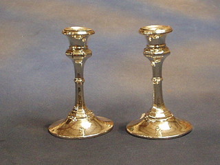 A pair of silver candlesticks 6" (marks rubbed)
