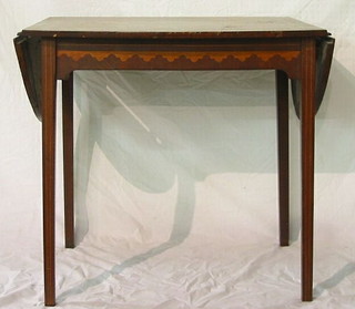 An 18th Century Dutch mahogany sofa table, inlaid marquetry throughout,  raised on square tapering supports, 31"