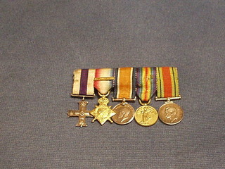 A group of 5 miniature medals comprising Military Cross, 1914 Star, British War medal, Victory medal and Defence medal