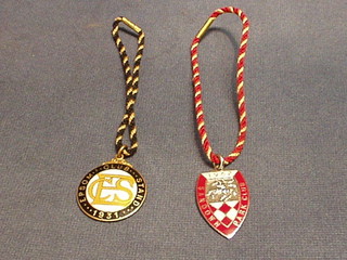 A 1931 Epsom Club Stand enamelled member's badge and a 1962 Sandown Park member's badge