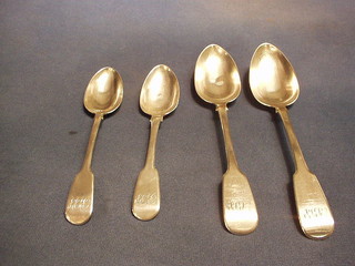 A Georgian silver fiddle pattern serving spoon and 2 Georgian silver pudding spoons 7 ozs