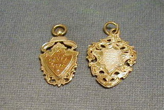 2 silver watch chain medallions