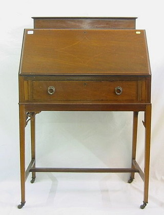 An Edwardian inlaid mahogany bureau the base fitted 1 long drawer, raised on square tapering supports with H framed stretcher 30"