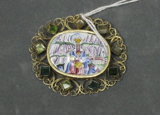 An Eastern oval enamelled pendant decorated Mary and Christ contained in a pierced gilt metal mount