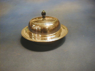 A silver plated muffin dish and cover