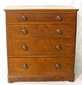 A Victorian mahogany D shaped chest of 4 long drawers with tore handles 37"