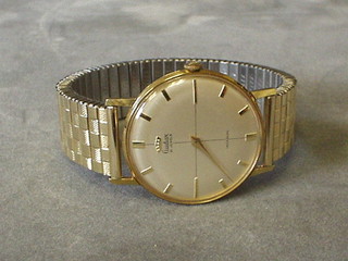 A gentleman's wristwatch by Audax contained in a "gold" case